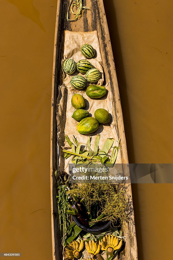 Floating market canoe with fruit