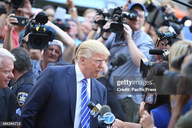 Donald Trump is surrounded by press upon arriving at 60 Centre Street for his first day of jury duty. Republican presidential nomination front runner...