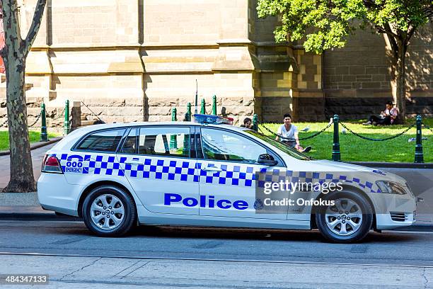 victoria state police car on duty, melbourne, australia - victoria police stock pictures, royalty-free photos & images