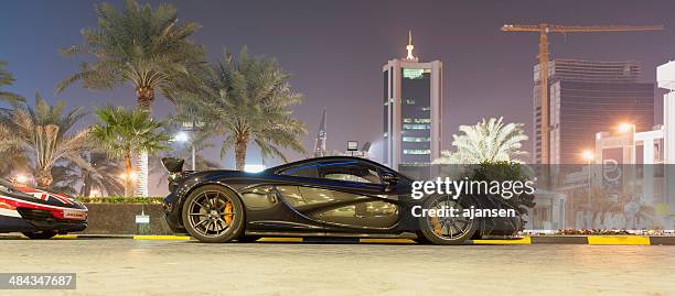 very exclusive mclaren p1 - bahrain finance stock pictures, royalty-free photos & images