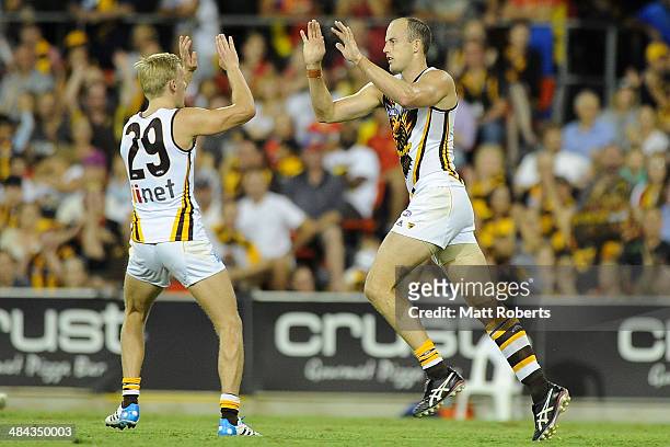 David Hale of the Hawks celebrates kicking a goal during the round four AFL match between the Gold Coast Suns and the Hawthorn Hawks at Metricon...