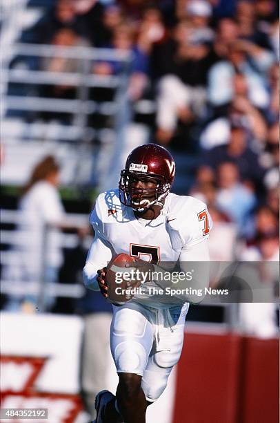 Michael Vick of the Virginia Tech Hokies runs with the ball against the Boston College Eagles on September 30, 2000.