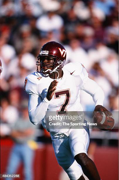 Michael Vick of the Virginia Tech Hokies runs with the ball against the Boston College Eagles on September 30, 2000.
