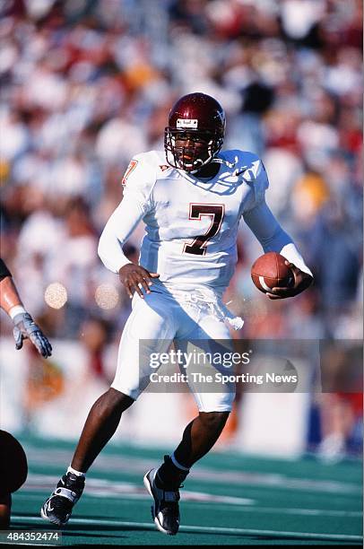 Michael Vick of the Virginia Tech Hokies runs with the ball against the Boston College Eagles on September 30, 2000.
