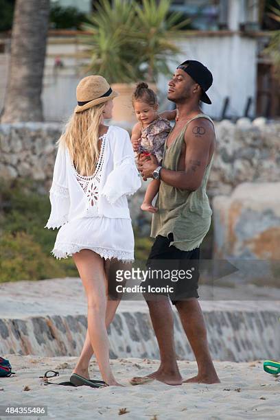 Doutzen Kroes and Sunnery james are seen spending a family day on the beach on August 17, 2015 in Ibiza, Spain.
