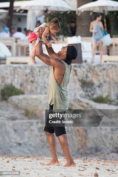 Doutzen Kroes and Sunnery james are seen spending a family day on the beach on August 17, 2015 in Ibiza, Spain.