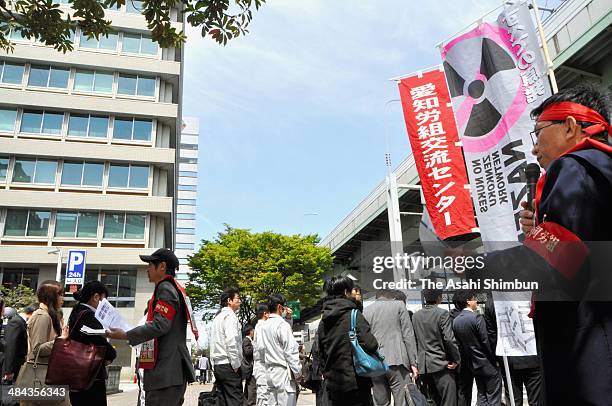Protesters march on in front of the Chubu Electric Power Co on April 11, 2014 in Nagoya, Aichi, Japan. The new basic energy plan, approved by the...