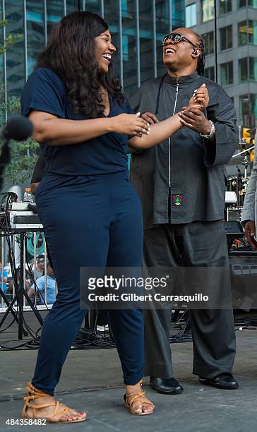 Recording artist Jazmine Sullivan and musician Stevie Wonder on stage during Wonder Moments - Songs In The Key Of Life Performance Tour at Dilworth...