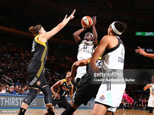 Essence Carson of the New York Liberty shoots the ball against the Tulsa Shock on August 15, 2015 at Madison Square Garden, New York City , New York....