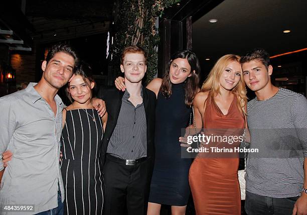 Tyler Posey, Danielle Campbell, Cameron Monaghan, Sadie Newman, Bella Thorne and Gregg Sulkin attend Monaghan's birthday dinner at The District by...