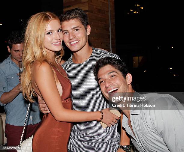 Bella Thorne, Gregg Sulkin and Tyler Posey attend Cameron Monaghan's birthday dinner at The District by Hannah An on August 15, 2015 in Los Angeles,...