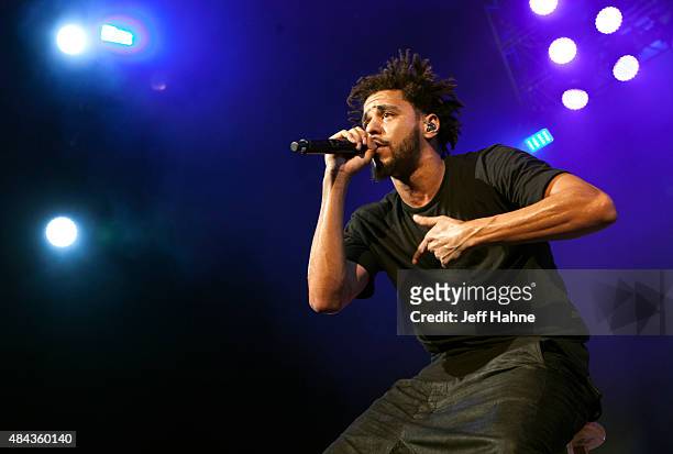 Rapper J. Cole performs at PNC Music Pavilion on August 12, 2015 in Charlotte, North Carolina.