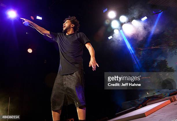 Rapper J. Cole performs at PNC Music Pavilion on August 12, 2015 in Charlotte, North Carolina.