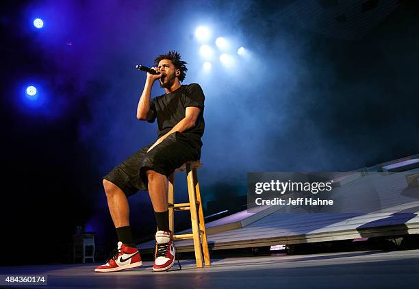 Rapper J. Cole performs at PNC Music Pavilion on August 12, 2015 in Charlotte, North Carolina.