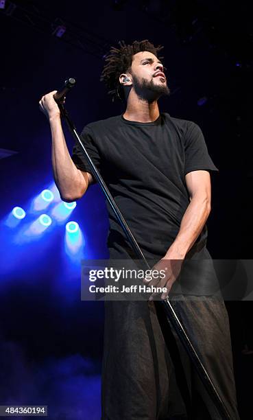 Rapper J. Cole performs at PNC Music Pavilion on August 12, 2015 in Charlotte, North Carolina.