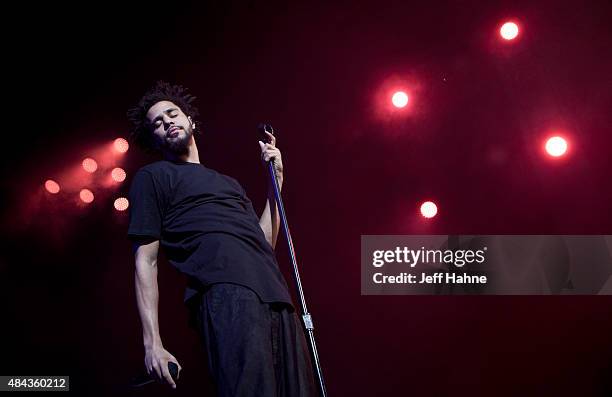 Rapper J. Cole performs at PNC Music Pavilion on August 12, 2015 in Charlotte, North Carolina.