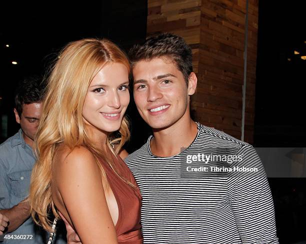 Bella Thorne and Gregg Sulkin attend Cameron Monaghan's birthday dinner at The District by Hannah An on August 15, 2015 in Los Angeles, California.