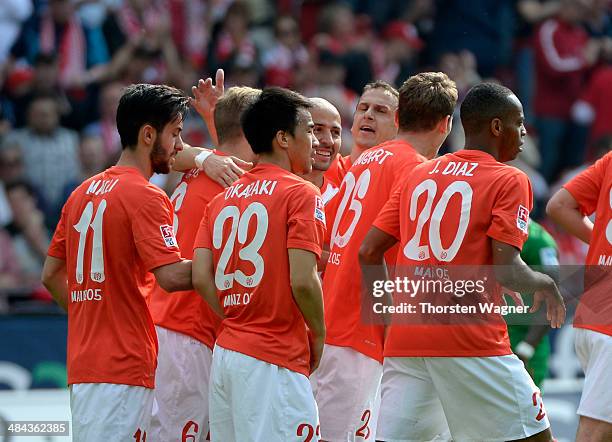 Players of Mainz celebrates after Nils Peteresen of Bremen is scoring the 1-0 with a own goal during the Bundesliga match between FSV Mainz 05 and SV...