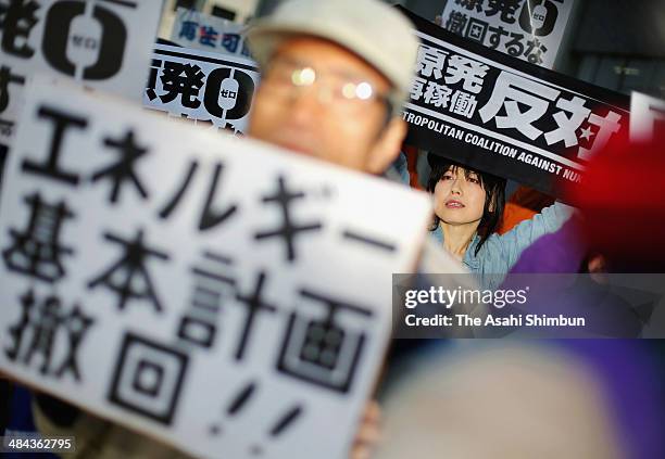 Protesters march on near the Prime Minister's official residence on April 11, 2014 in Tokyo, Japan. The new basic energy plan, approved by the...