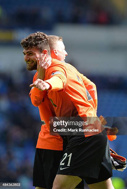 Nadir Ciftci of Dundee celebrates their victory during the William Hill Scottish Cup Semi Final between Rangers and Dundee United at Ibrox Stadium on...