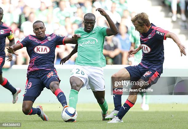 Ismael Diomande of Saint-Etienne in action between Nicolas Maurice-Belay and Clement Chantome of Bordeaux during the French Ligue 1 match between AS...