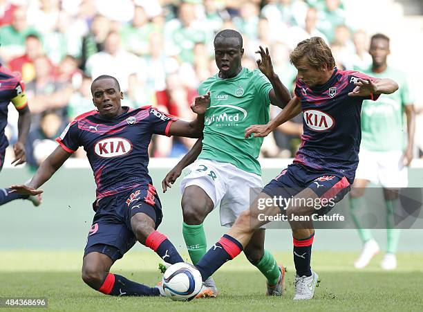 Ismael Diomande of Saint-Etienne in action between Nicolas Maurice-Belay and Clement Chantome of Bordeaux during the French Ligue 1 match between AS...