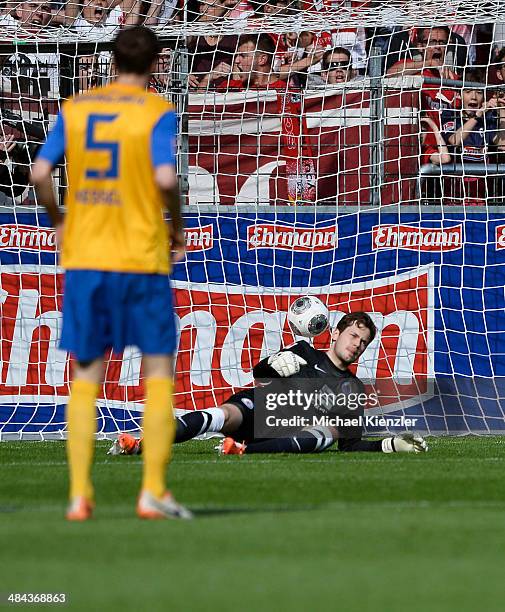 Daniel Davari and Benjamin Kessel of Braunschweig receive a second goal during the Bundesliga match between SC Freiburg and Eintracht Braunschweig at...