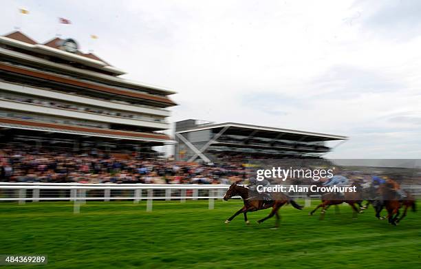 Jamie Spencer riding Gabrial's Kaka win The Berry Bros & Rudd Magnum Spring Cup at Newbury racecourse on April 12, 2014 in Newbury, England.