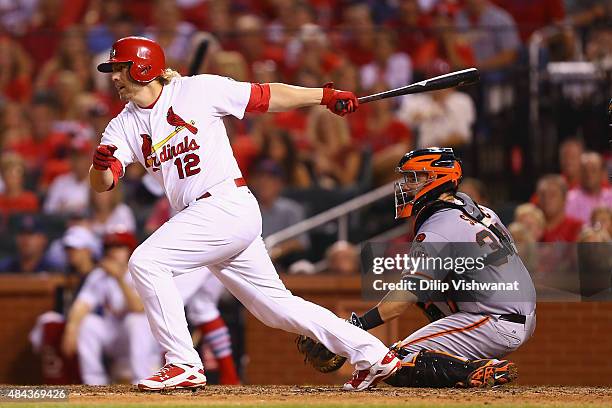 Mark Reynolds of the St. Louis Cardinals knocks in the game-winning run against the San Francisco Giants in the eighth inning at Busch Stadium on...