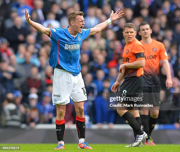 Dean Shiels of Rangers reacts during the William Hill Scottish Cup Semi Final between Rangers and Dundee United at Ibrox Stadium on April 12, 2014 in...