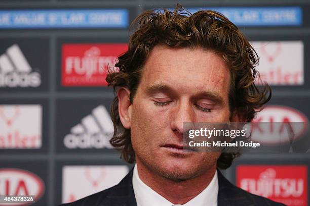 Bombers head coach James Hird cries as he talks to the media following the announcement of his resignation as head coach at True Vaule Solar Centre...