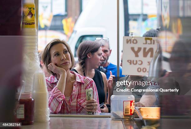 August 17: Republican presidential candidate Carly Fiorina waits her turn in line to purchase a "diabetic lemonade" at the Iowa State Fair in Des...