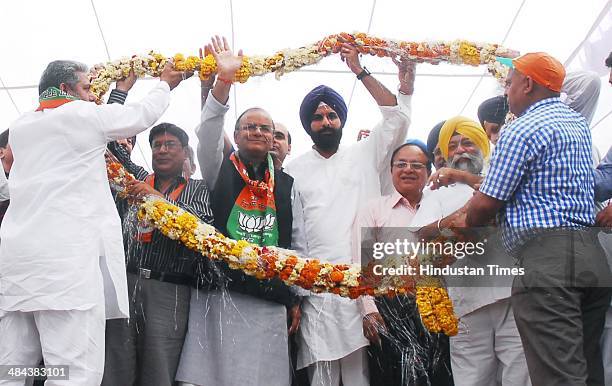 Lok Sabha Candidate Arun Jaitley and Punjab Cabinet Minister Bikram Singh Majithia during an election campaign rally at Vallah Fruit and Vegitable...