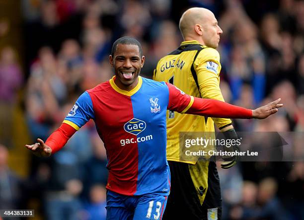 Despair for Brad Guzan of Aston Villa as Jason Puncheon of Crystal Palace celebrates as he scores their first goal during the Barclays Premier League...