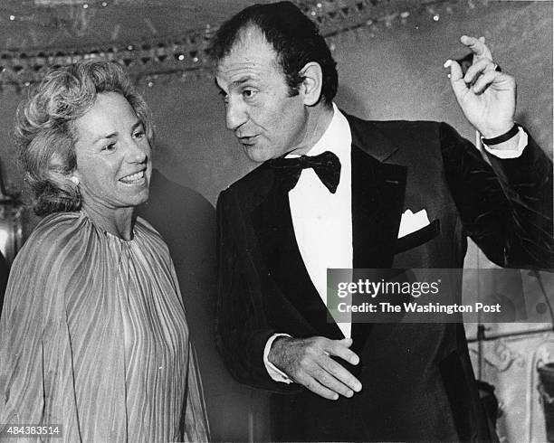 Ethel Kennedy and Iranian Ambassador Ardeshir Zahedi share a few words as she arrives for the ambassador's dinner party on March 8, 1975.