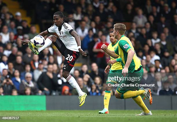 Hugo Rodallega of Fulham looks to bring the ball down during the Barclays Premier League match between Fulham and Norwich City at Craven Cottage on...