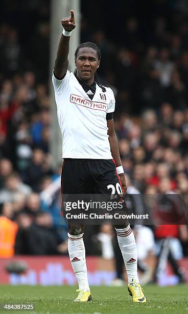 Hugo Rodallega of Fulham celebrates the teams win at the final whistle during the Barclays Premier League match between Fulham and Norwich City at...