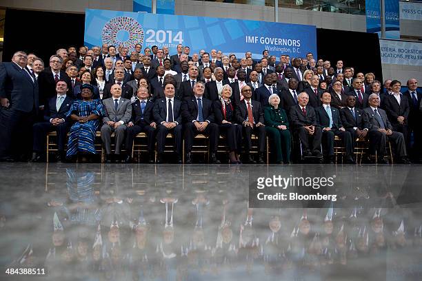 International Monetary Fund governors attend the family photograph during the IMF and World Bank Group Spring Meetings in Washington, D.C., U.S., on...