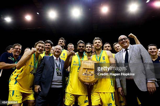 Patty Mills and Matthew Dellavedova of the Boomers hold the Al Ramsay Shield after winning the game two match between the New Zealand Tall Blacks and...