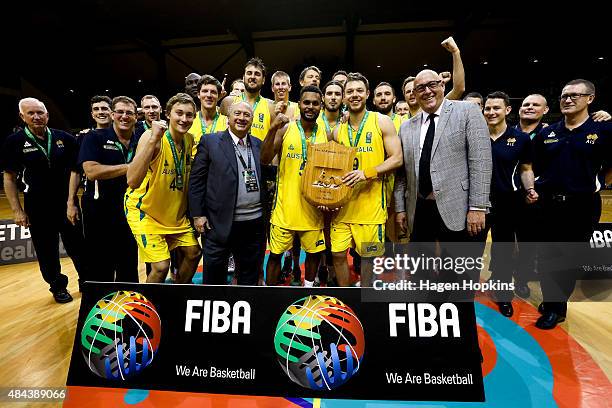 Patty Mills and Matthew Dellavedova of the Boomers hold the Al Ramsay Shield after winning the game two match between the New Zealand Tall Blacks and...