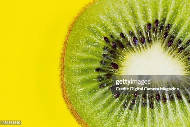 Close-up detail of a sliced kiwi fruit, taken on July 4, 2014.