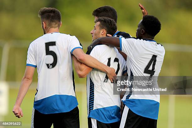 Newcastle United u21 Jamie Sterry is mobbed by players after equalising during the match between Newcastle United and Blackburn Rovers U21 on August...