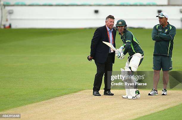 Australian Chairman of Selectors Rod Marsh, Michael Clarke of Australia and Australian coach Darren Lehmann inspect the pitch during a nets session...