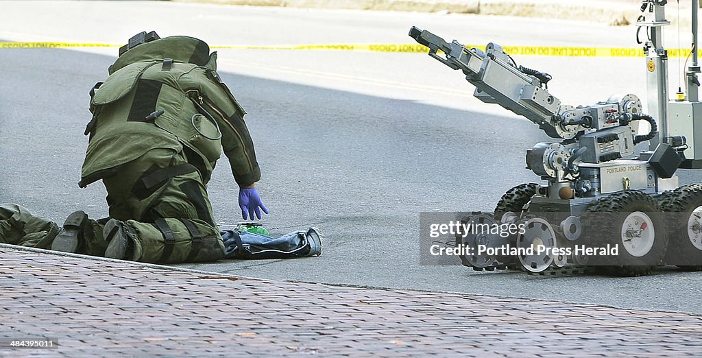 A Portland police bomb team disposes of a device