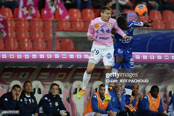 Bastia's Malian defender Drissa Diakite vies with Evian's Argentinean forward Marco Ruben during the French L1 football match between Evian Thonon...