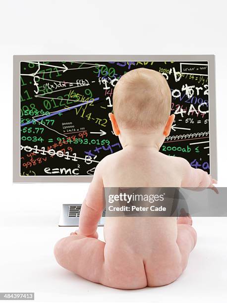 baby looking at equations on computer screen - ass boy stock pictures, royalty-free photos & images