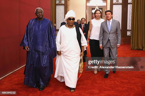 President Lamine Diack and his wife Bintou Diack arrives with Lord Sebastian Coe and his wife Carole Coe for the IAAF Congress Opening Ceremony at...