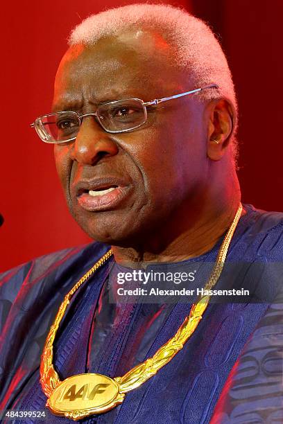 President Lamine Diack receives the Golden Order of Merit during the IAAF Congress Opening Ceremony at the Great Hall of the People at Tiananmen...