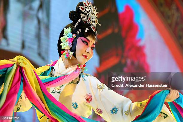 Chinese artist performe during the IAAF Congress Opening Ceremony at the Great Hall of the People at Tiananmen Square on August 18, 2015 in Beijing,...