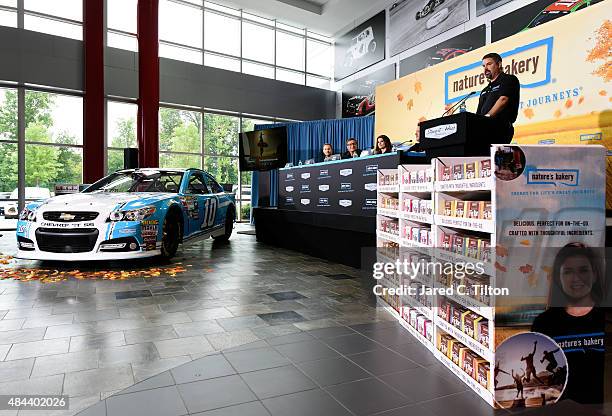 Sam and Dave Marson, co-founders of Nature's Bakery, Danica Patrick, driver of the Stewart-Haas Racing Chevrolet, and Tony Stewart, co-owner of...